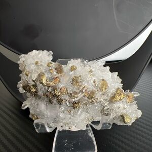Pyrite in clear quartz naturally forming cluster